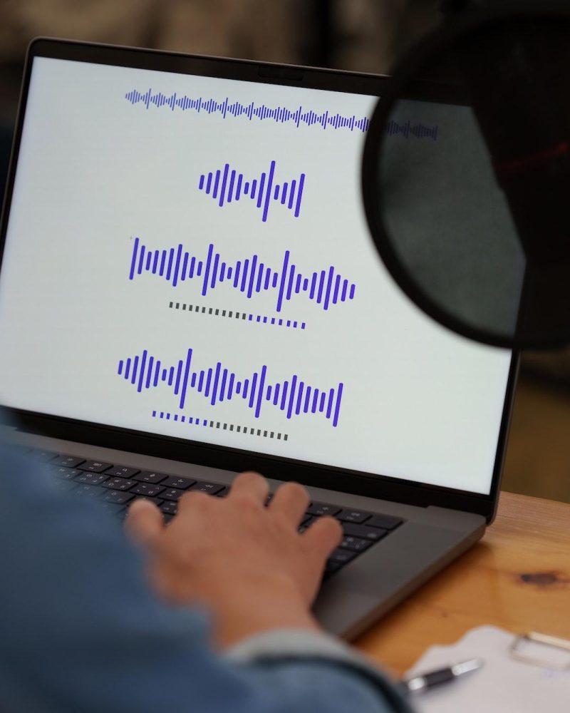 podcaster-editing-audio-podcast-working-at-home-studio.jpg